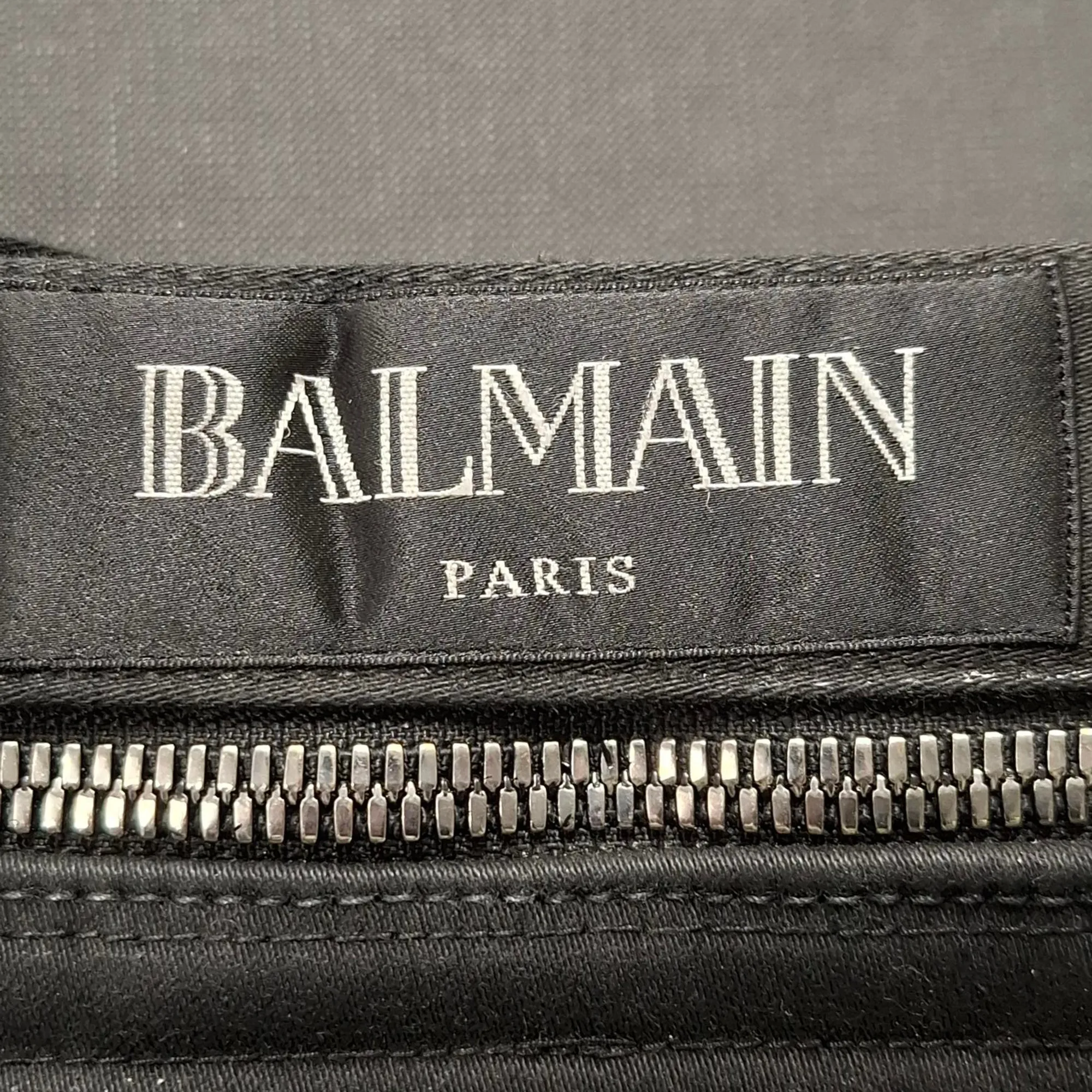 Balmain Waxed Slim-Fit Biker Jeans in Black Cotton Denim