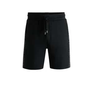 shorts with monogram-pattern panels